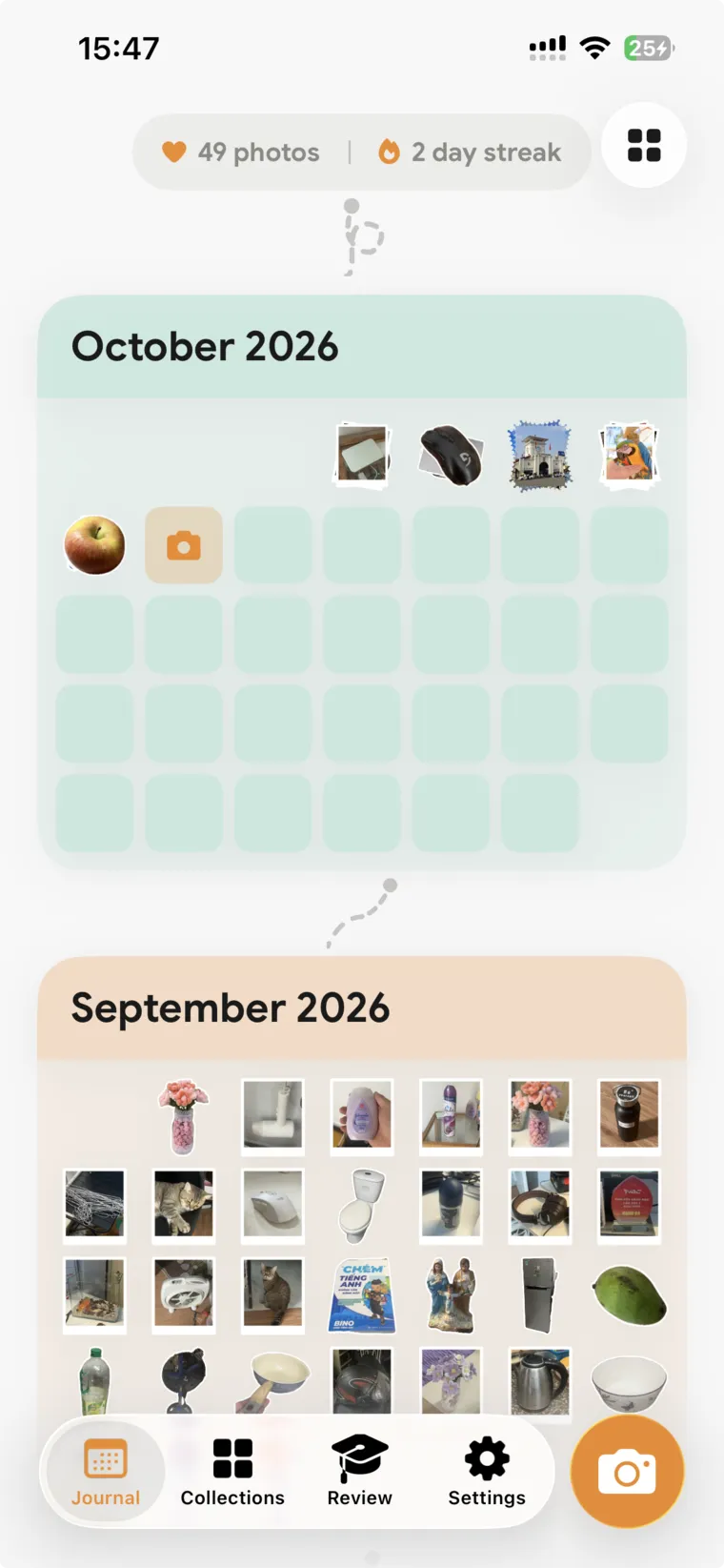 The journal calendar for October 2026, photos on the days they were taken, with a two-day streak.
