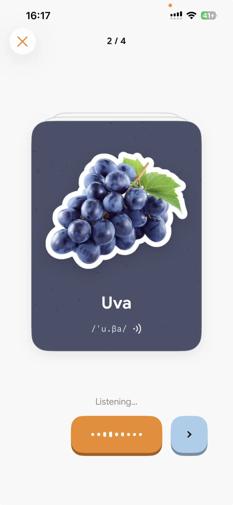 Card two of four: grapes on a dark flashcard reading Uva, with the microphone lit and “Listening…” beneath it.